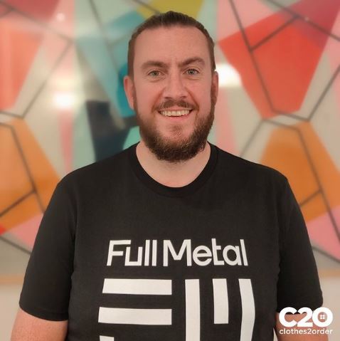 Customer wearing a 'full metal' design t-shirt