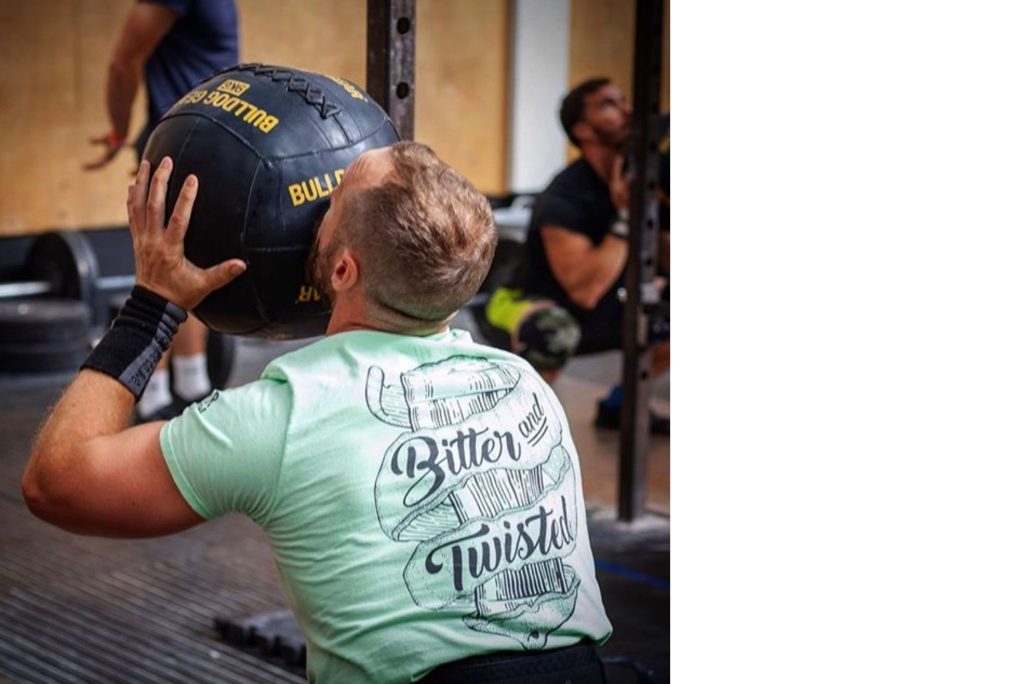 Bitter and Twisted CrossFit member wearing branded merch in the gym.
