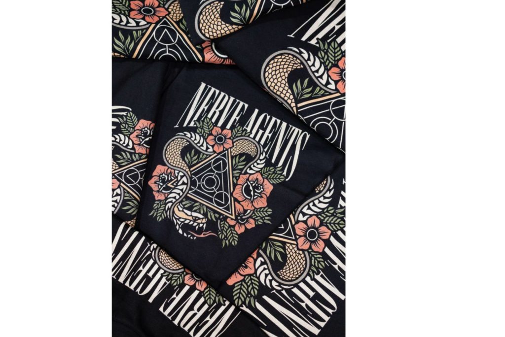 A bright, bold logo printed on a black t-shirt